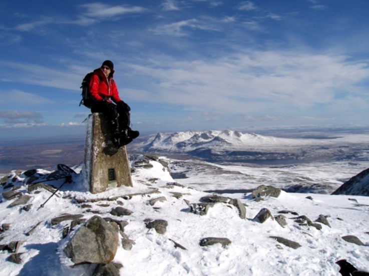 John Pearce on summit of Ben Hope by Pippa Manson