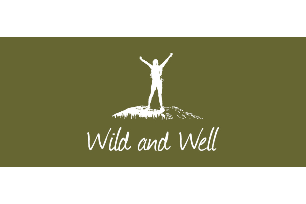 Wild and Well logo white on olive rectangle