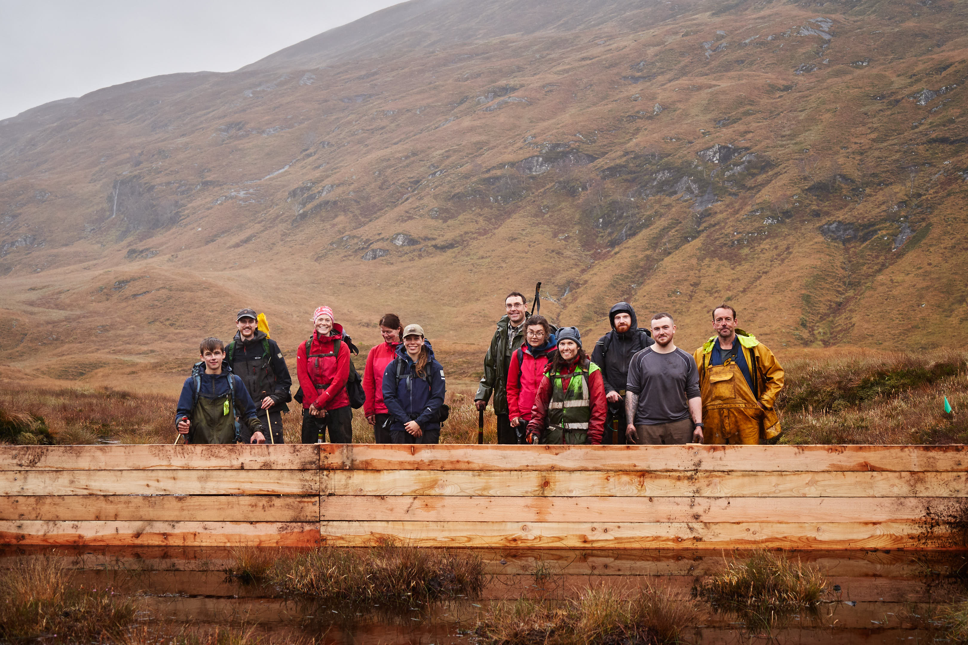 The leaky wooden dam will help to raise the water level