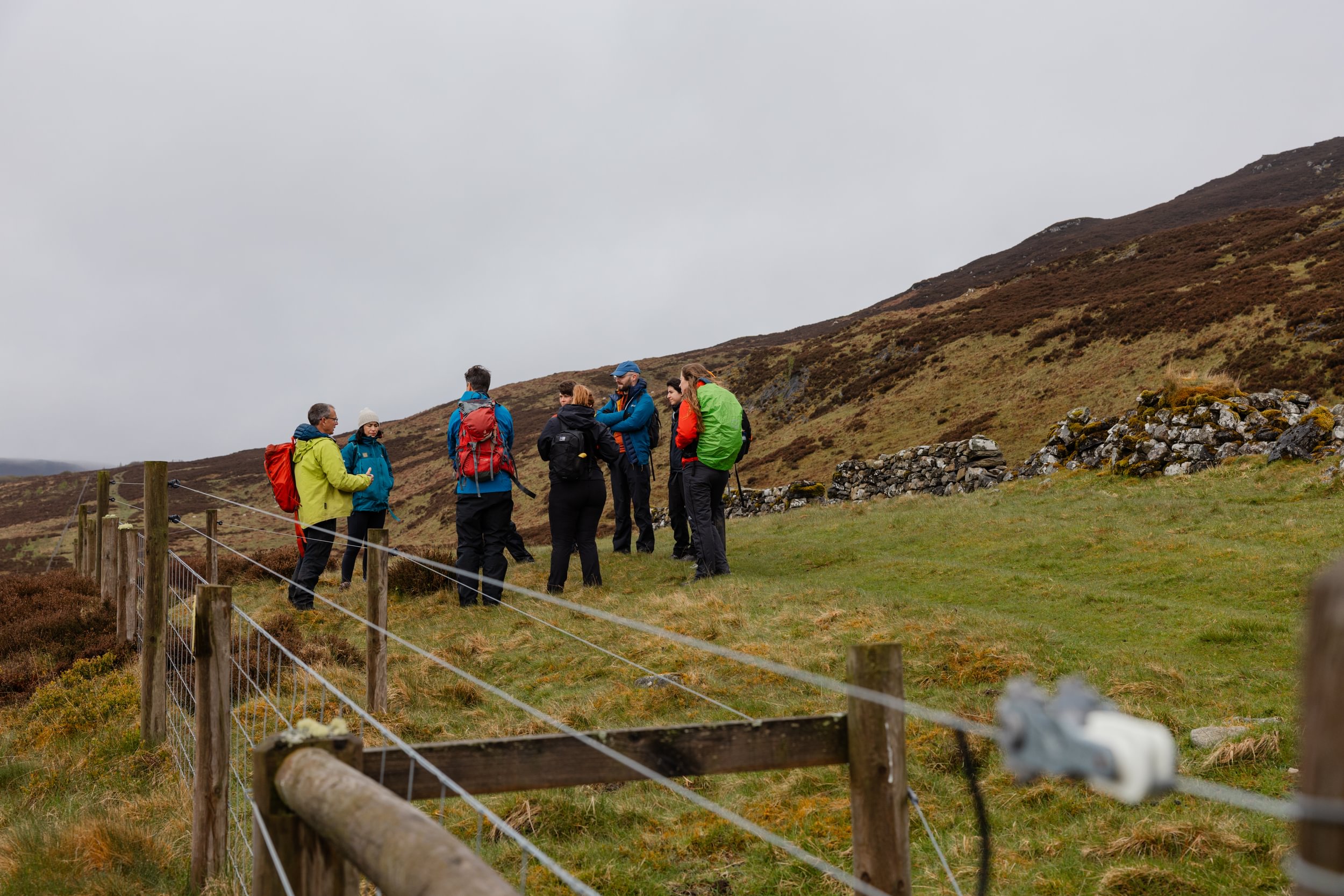 David Balharry by the existing fence at Schiehallion
